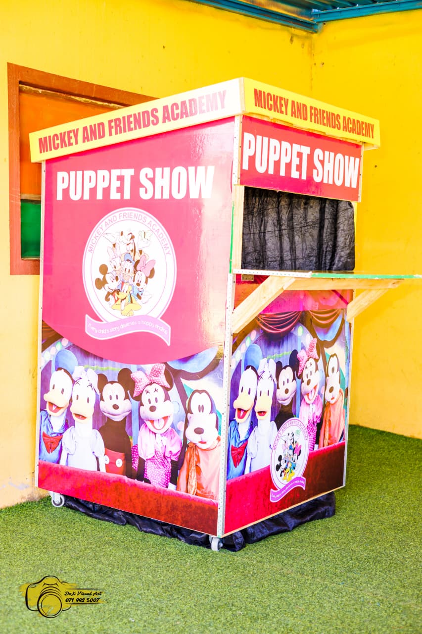 The Mickey and Friends Academy puppet show theatre on the playground
