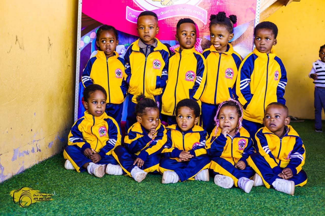 Students in academy tracksuits